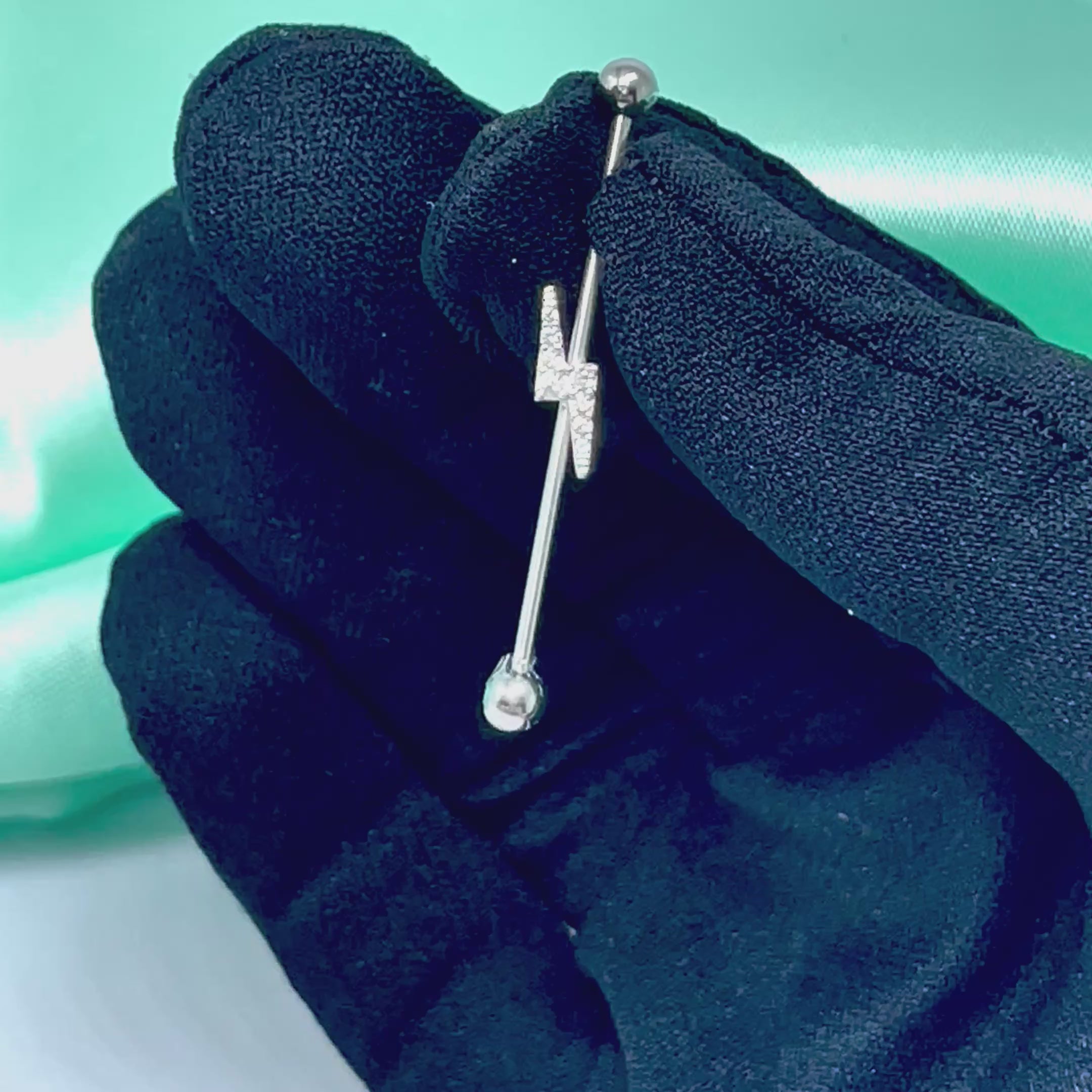 Piercing Transversal Raio Cravejado